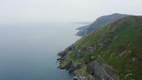 Aerial-view-of-the-Bray-Head-cliffs-with-people-walking-about-the-trails-3