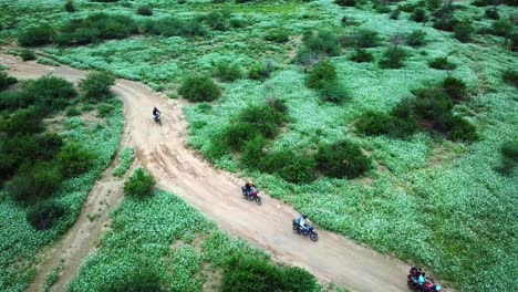 Adventure-Motorcycle-Rides-Around-Nature-Reserve-In-Lake-Magadi,-Rift-Valley-Kenya,-East-Africa