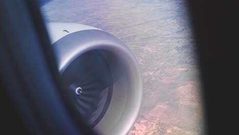Airplane-engine-mid-air-as-seen-from-the-passenger-window