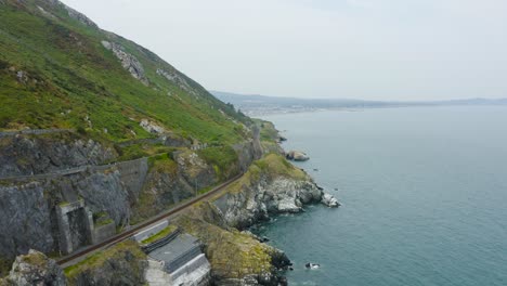 Aerial-view-of-the-Bray-Head-cliffs-with-people-walking-about-the-trails-2