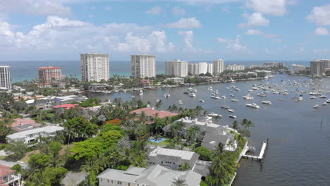 Sideways-drone-shot-over-waterway-canal-for-boats-and-yachts-in-Fort-Lauderdale-Miami-Florida-beach-life