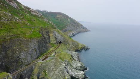 Aerial-view-of-the-Bray-Head-cliffs-with-people-walking-about-the-trails