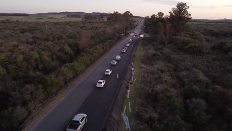 Line-of-cars-in-a-row-queuing-on-rural-rectilinear-highway-of-Uruguay