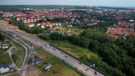 Highway-in-Poland-near-Gdynia,-aerial-view-of-busy-traffic