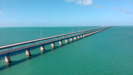 Wide-slow-moving-left-aerial-drone-shot-of-7-Mile-Bridge-in-Florida-Keys