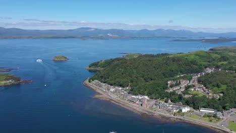 Oban-droneshot-panning-along-the-harbour-and-out-into-the-distance