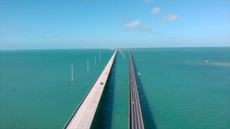 Static-double-highway-aerial-drone-shot-of-7-Mile-Bridge-in-Florida-Keys-with-cars