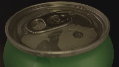 Macro-dolly-out-of-droplets-on-top-of-spinning-soda-can