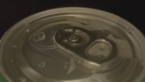 Close-Macro-view-of-droplets-on-top-of-spinning-soda-can