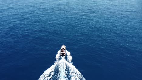 A-boat-speeding-in-the-Mediterranean-Sea-in-Greece