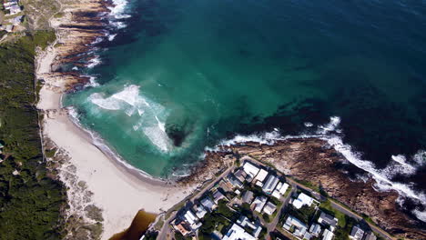 Surfing-beach-and-lagoon-at-popular-holiday-town-Onrus,-South-Africa