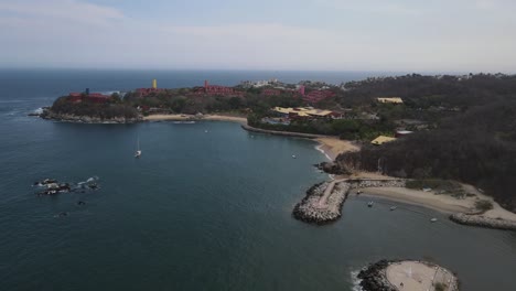 Drone-flight-over-the-Huatulco-beach-in-a-summer-day