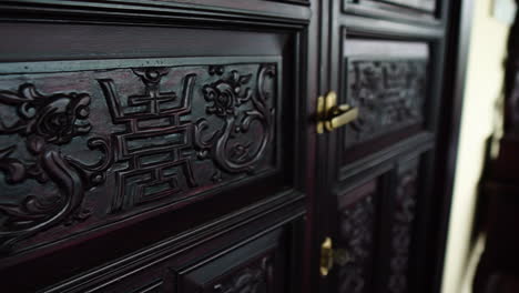 Closed-Doors-with-Chinese-Engraving-inside-a-House-in-Vietnam