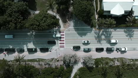 South-Ocean-Boulevard-with-Traffic-and-Parked-Vehicles-Looking-Down-from-Above-with-a-Drone-Shot-Panning
