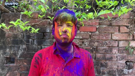 Video-of-a-boy-after-playing-Holi,-zoomed-out