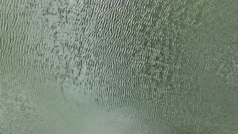 Abstract-Aerial-Drone-Shot-of-Water-Ripples