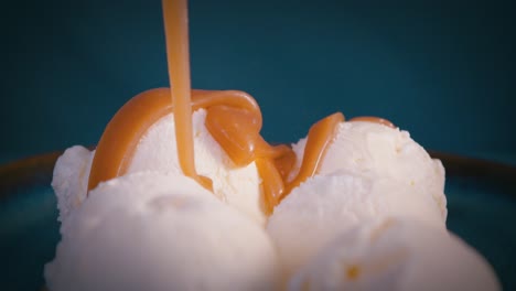 Pouring-liquid-caramel-on-ice-cream