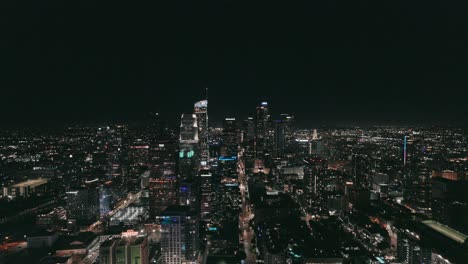 Wide-view-of-downtown-LA-at-night-from-a-top-a-skyscraper