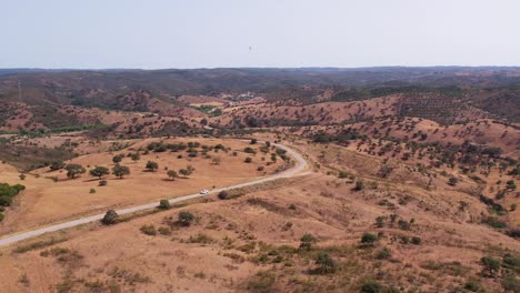 Aerial-Panorama-Of-A-Remote-Road-In-Countryside-Landscape-Of-Alentejo,-Portugal