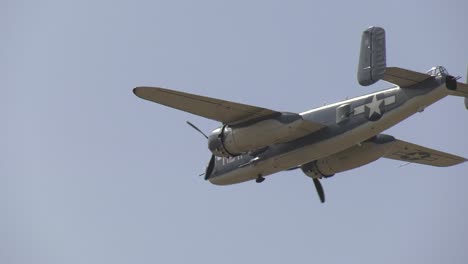 War-plane-flying-over-field
