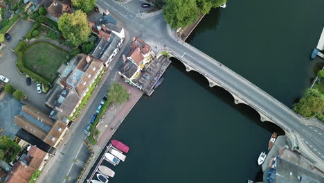Impressive-sunrise-drone-shot-of-Henley-on-Thames-bridge-and-town-centre