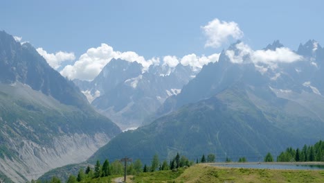 View-of-grand-montets-and-a-lake-in-a-sunny-day-with-natural-light