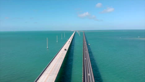 Slowly-rising-drone-shot-of-7-mile-bridge-in-the-Florida-keys-with-two-bridges