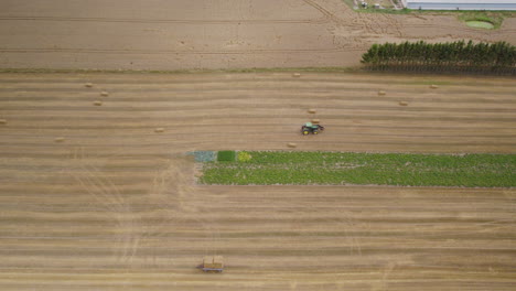 Aerial-Panoramic-View-Of-Farmland-During-Harvest---drone-shot