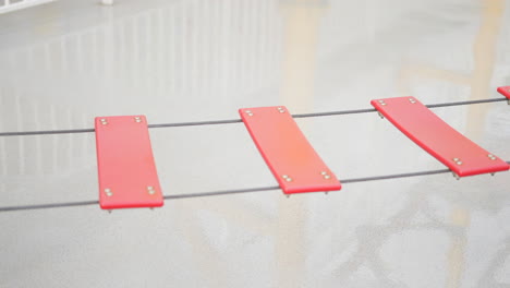 Zip-line-and-suspension-bridge-for-kids-red