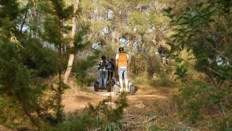 A-group-of-tourists-ride-off-road-Segways-through-the-fields-and-forests-of-Mallorca