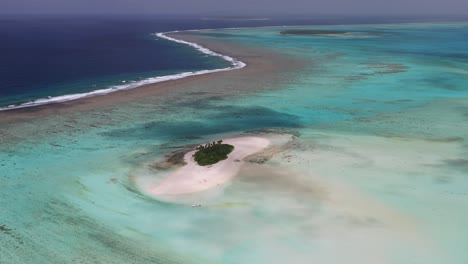 Aerial-fly-over-of-expansive-shallow-coral-reef-system-in-Kingdom-of-Tonga