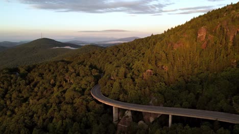 Aerial-pullout-from-below-the-viaduct-on-grandfather-mountain-nc,-north-carolina