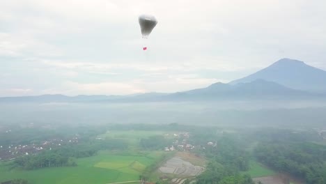 Aerial-view-of-Indonesian-Traditional-Balloon-with-indonesian-flag