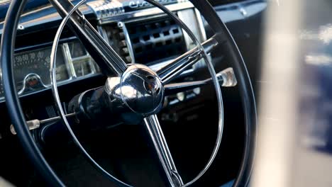 Premium stock video - A steering wheel from a sports-car while driving
