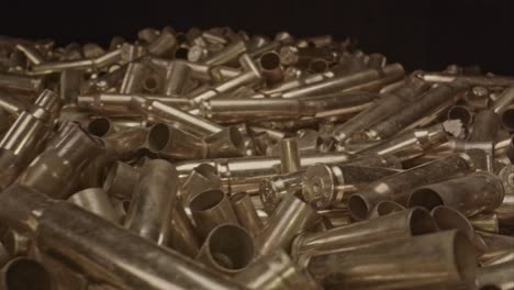Macro-dolly-of-out-of-a-large-pile-of-spent-bullet-casings