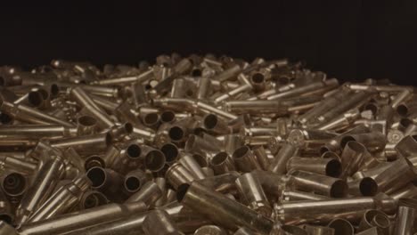 Macro-zoom-out-of-fired-ammunition-casings