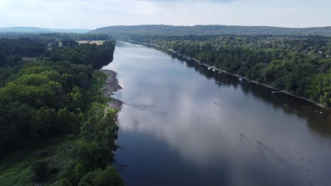 Flying-over-the-Delaware-river-on-a-sunny-cloudy-day