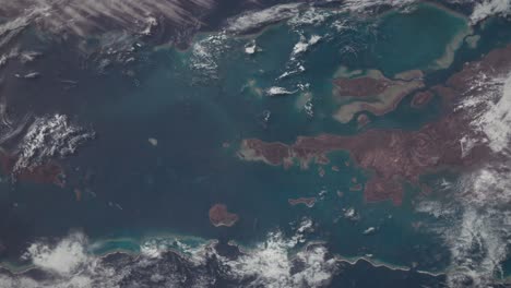 Aerial-Shot-of-Tropical-Islands-and-Ocean-Seen-From-Orbit