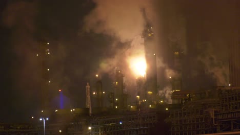 Oil-Refinery-towers-flaring-off