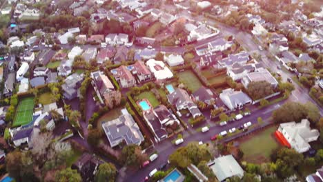 Golden-hour-aerial-over-ocean,-view-of-Rangitoto-Island,-Auckland,-New-Zealand