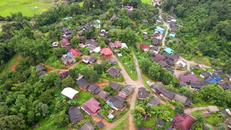 Aerial-Overhead-View-Of-Karen-Tribe-Village-In-Chiang-Mai-And-Terrace-Farms-On-Hillside