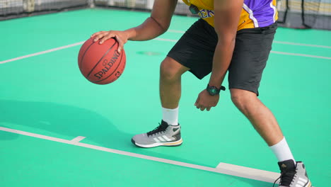 One-person-playing-basketball-in-a-cruise-closeup-view-of-Singapore