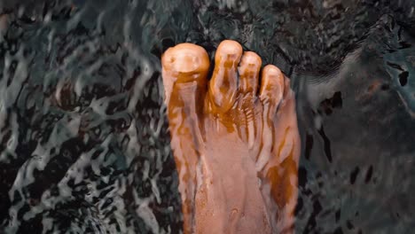 Feet-Bathing-In-Stream-Close-Up