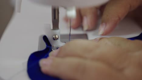 Closeup-on-sewing-machine-in-action,-making-creative-handmade-crafts