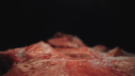 Close-Up-Dolly-Macro-Probe-Lens-Studio-Shot,-Defrosted-Fresh-Uncooked-Raw-Red-Icy-Meat,-Culinary-Raw-Food-Thawed-Product