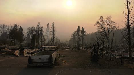 Vehicles-and-town-burned-by-wildfire