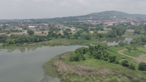 AERIAL---Jabi-Reservoir-lake-in-Abuja,-Nigeria,-Africa,-forward