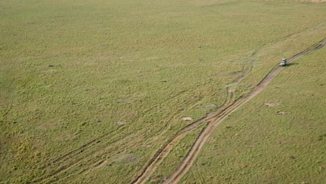 Aerial-Footage-Of-A-Jeep-Tour-In-Maasai-Mara-National-Reserve