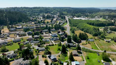 Aerial-of-homes-with-water-views-in-Freeland,-Washington