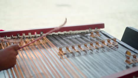 Traditional-Greek-string-instrument-being-played-close-up